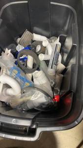 lot 206 image: Lot of Plumbing Supplies including Fittings, Hoses, and Adhesives
