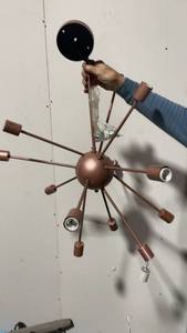 lot 210 image: Mid-Century Modern Copper Starburst Chandelier with 12 Lights