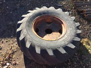lot 120 image: Used Goodyear 18.4 - 24 Industrial Sure Grip TireRim