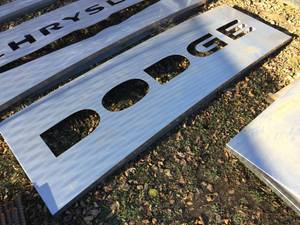 lot 130 image: Dodge Large Metal Sign 82 x 32