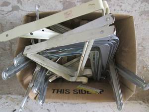 Box of metal shelf brackets...