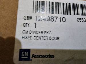 Walk through partition with a door, brand new from GM