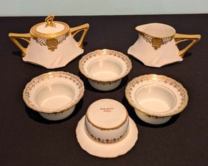 lot 142 image: Limoges White and Gold Porcelain Sugar Creamer and Small Bowls