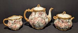 lot 112 image: Limoges Painted Porcelain Teapot and SugarCreamer