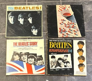 lot 235 image: Four Record Albums by The Beatles and Paul McCartney