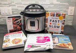 lot 165 image: 8qt InstantPot Cooker and Cookbooks