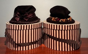 lot 322 image: Beautiful Vintage Brown & Floral Hat and Black with Brown Ribbon and Bow Hat by Ann Vuille including 2 Hat Box by Henribendel NY