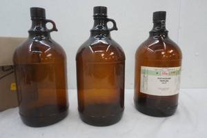 3 Vintage amber glass pharmacy jugs