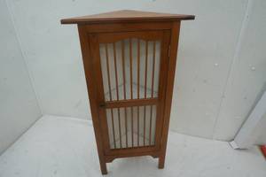 Vintage wood corner shelf with door
