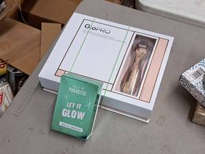 lot 760 image: Isle of Paradise Let It Glow Medium Self Tanning Drops, GloPro Microneedling Rejuvenation Tool
