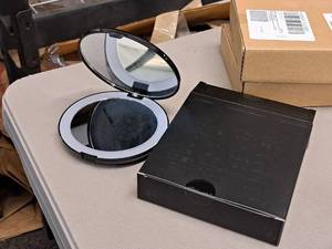 lot 759 image: Lot of (2) Pop Sonic LED  Compact Mirror - Magnifying Compact Mirror with LED Lights