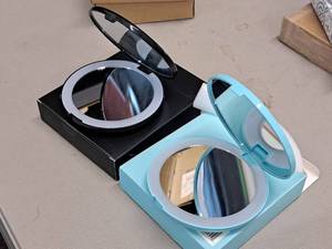 lot 757 image: Lot of (2) Pop Sonic LED  Compact Mirror - Magnifying Compact Mirror with LED Lights