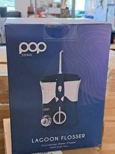 lot 725 image: Pop Sonic Countertop Water Flosser (New )