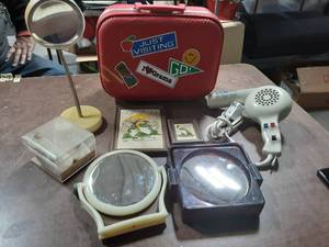 Collectible Small Suitcase, Assorted Mirrors, Baby Booties, Hair Drier, Framed Needlework, Hair Remover Machine