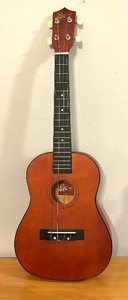 lot 194 image: Rouge Baritone Ukulele