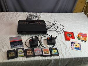 lot 34 image: Atari 2600 Video Game Console Bundle with 6 Games and Accessories