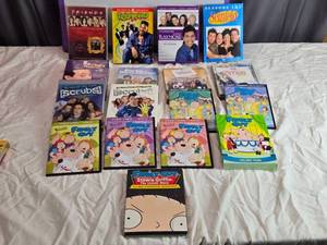 lot 57 image: Large DVD Collection of Popular TV Shows Including Family Guy, Friends, Seinfeld, and More - May Not Be Complete Seasons