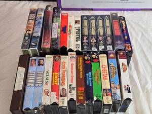 lot 61 image: Lot of 20 Vintage VHS Tapes Including Free Willy, Titanic, and Cool Runnings