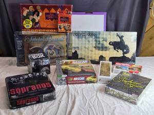 lot 62 image: Lot of 9 Board Games and Puzzles Including The Sopranos Trivia Game and NASCAR DVD Game