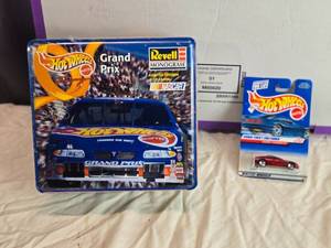 lot 63 image: Hot Wheels Grand Prix Collectors Set with Dodge Charger RT
