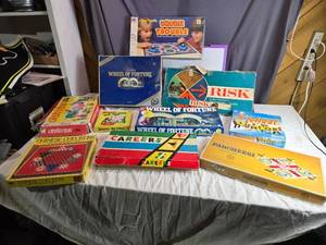 lot 65 image: Collection of Vintage Board Games Including Wheel of Fortune, Risk, and Scrabble Junior