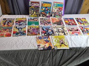 lot 67 image: Lot of Vintage Marvel Comics Including Conan, Captain Marvel, and Dazzler