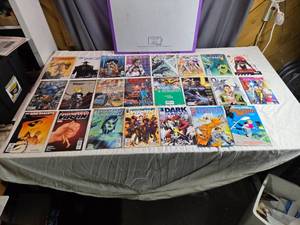 lot 76 image: Lot of Vintage and Modern Comic Books Including Conan, Vincent Price, and 100 Bullets