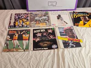 lot 151 image: Lot of 8 Sports Yearbooks and Scorebooks including Arizona State, UCLA, and Charles Barkley