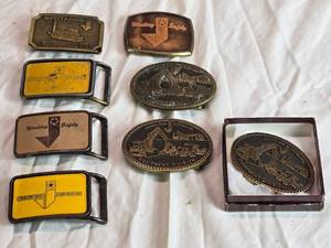 lot 186 image: Collection of 8 Vintage Safety Award Belt Buckles and Emblems  from Johnson Bros Corporation