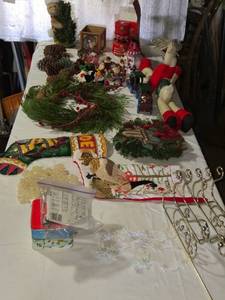 lot 217 image: Collection of Holiday Decor Including Stockings, Wreaths, and Ornaments