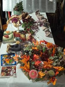 lot 253 image: Assorted Fall Decor Collection including Wreaths, Dolls, and Miscellaneous Items