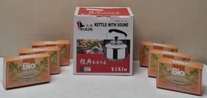 lot 12 image: (1) YiXin Kettle with Sound & (6) Boxes of Moringa Tea