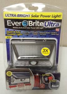 lot 18 image: Ever Brite Ultra   NEW  Motion-Activated Solar Powered LED Light