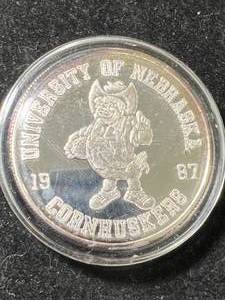 1 TROY OZ .999 FINE SILVER 1987 NEBRASKA CORNHUSKERS ROUND