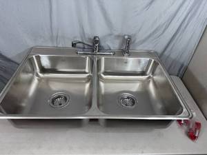 lot 9 image: New Stainless Steel Kindred Sink with Faucet and Drains