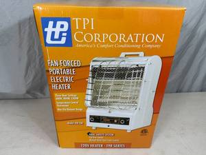 lot 11 image: New TPI Portable Electric Space Heater
