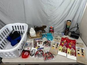lot 26 image: Laundry Basket, New and Used Household Goods, Alarm Clock, New Cookie Cutters, and More
