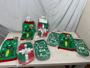 lot 45 image: New Holiday Themed Dog Sweaters - Size Small and XS