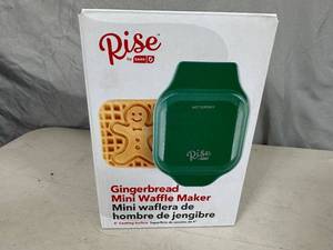 lot 55 image: New Dash  Rise Gingerbread Mini Waffle Maker