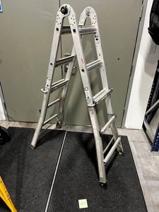 lot 89 image: Used Aluminum Multi-Position Adjustable Ladder