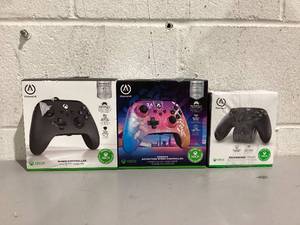 lot 503 image: LOT OF 2 Power A Xbox Controllers with Charging Stand