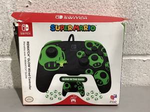 lot 506 image: PDP Gaming Rematch Wired Controller for Nintendo Switch - 1Up Glow In The Dark
