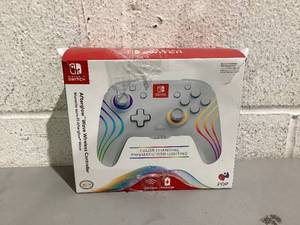 lot 508 image: PDP Afterglow Wave Wireless Pro Controller with Full Motion for Nintendo Switch