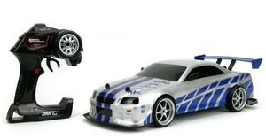 lot 498 image: Fast & Furious 110 Nissan Skyline GT-R R34 Drift RC Radio Control Cars