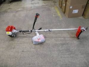Weed whip gas powered. Like new...