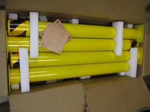 4 yellow parking lot posts...