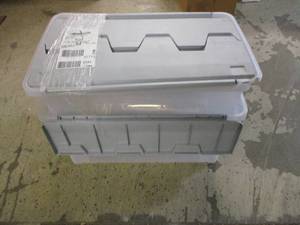 2 storage totes and a box of batter...