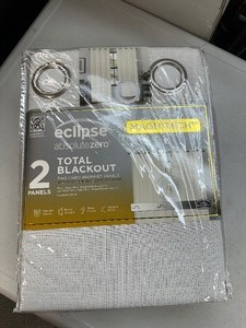 lot 187 image: New 2 Pack of Eclipse Absolute Zero Total Blackout Curtains with Magnetic Closing - Both 52 x 84 Total 104 x 84 Coverage - Oscar Ivory