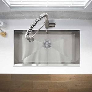 lot 35 image: Kohler Pro-Inspired Stainless Steel Kitchen Sink Kit With Sink, Faucet, Bamboo Cutting Board, Silicone Mat, Drain Strainer & Hardware