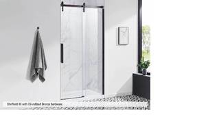 lot 52 image: OVE Decors 48 Sheffield Barn Door Tempered Glass Shower Door In Oil Rubbed Bronze Retail $759.99